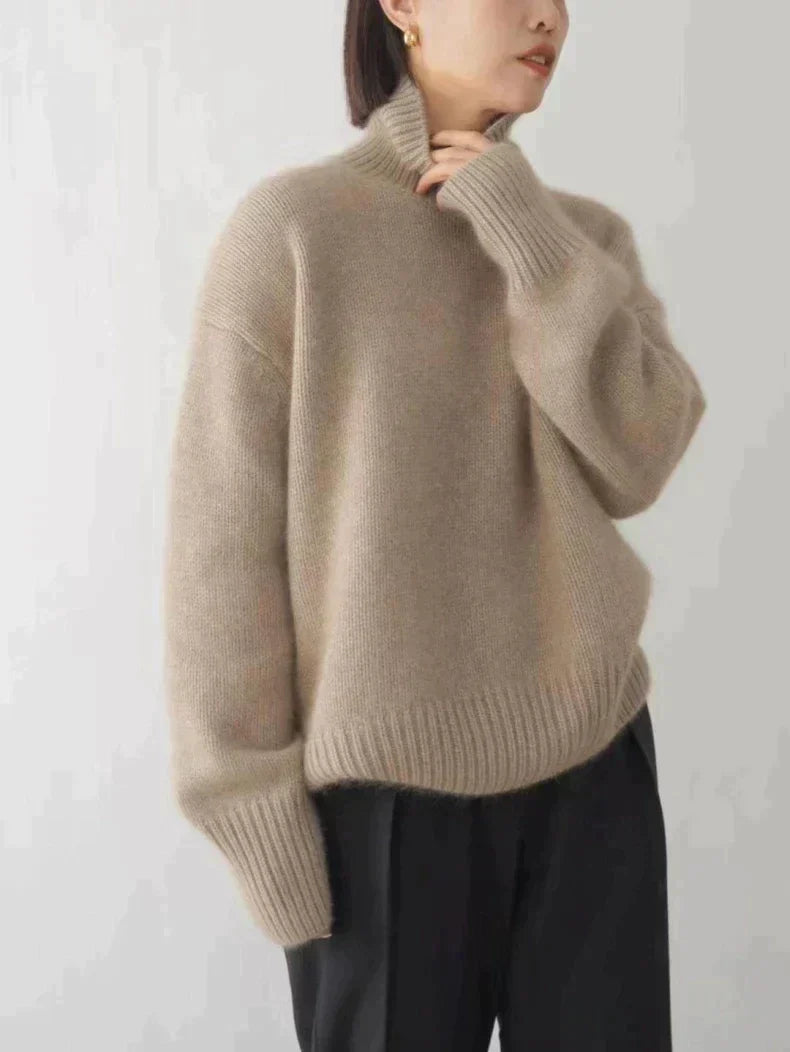 https://cdn.shopify.com/s/files/1/0646/0555/2908/files/Knit-Sweater-Turtleneck-Style-Relaxed-Fit-with-Ribbed-Details-5.webp?v=1745639140