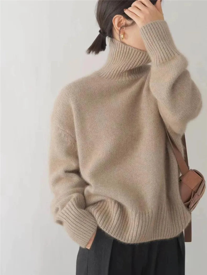 https://cdn.shopify.com/s/files/1/0646/0555/2908/files/Knit-Sweater-Turtleneck-Style-Relaxed-Fit-with-Ribbed-Details-6.webp?v=1745639140
