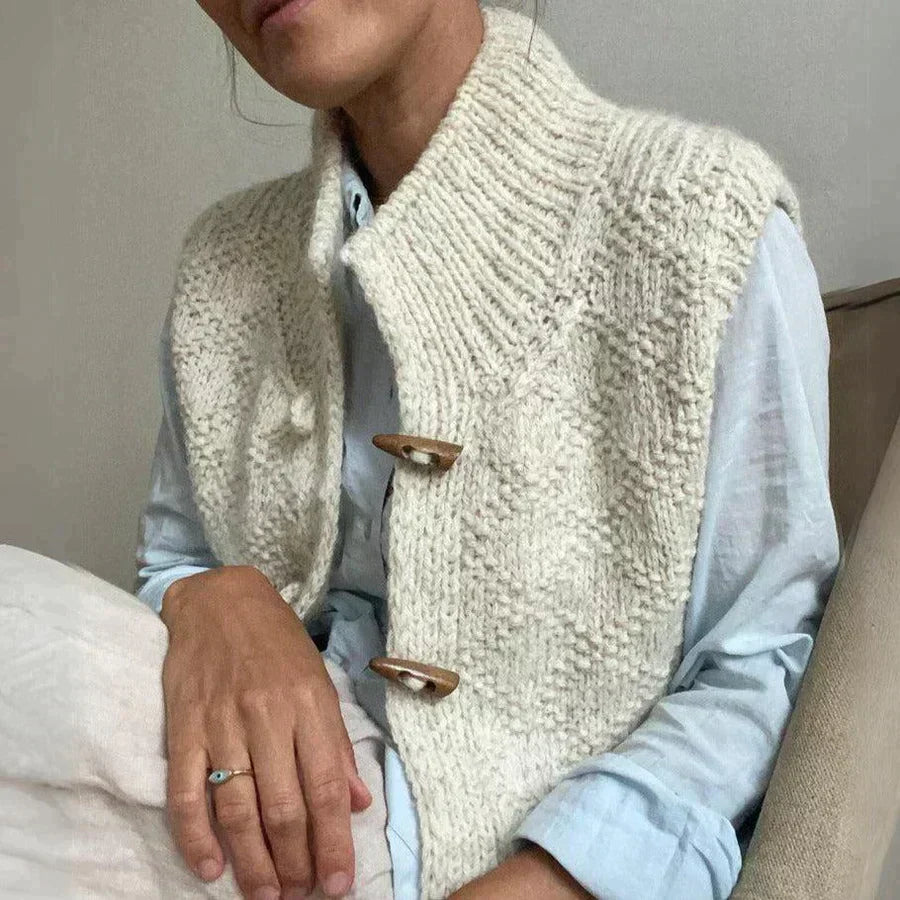 https://cdn.shopify.com/s/files/1/0646/0555/2908/files/Knitted-Button-Up-Vest-Textured-Knit-High-Collar-2.webp?v=1745639294