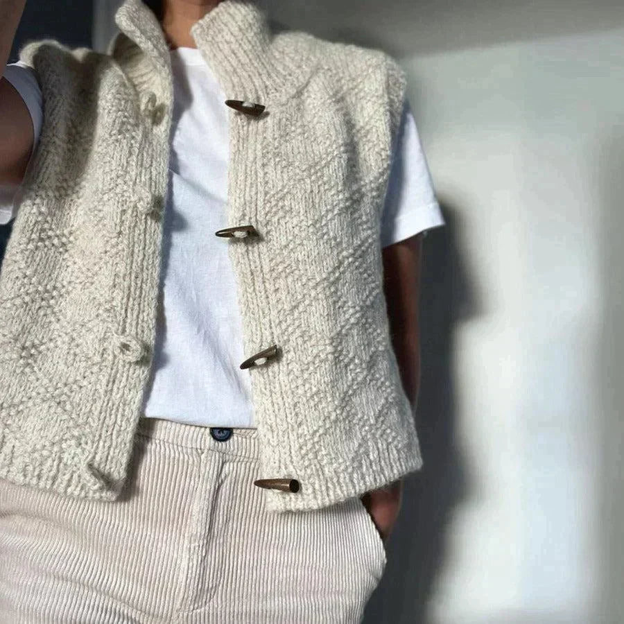 https://cdn.shopify.com/s/files/1/0646/0555/2908/files/Knitted-Button-Up-Vest-Textured-Knit-High-Collar-3.webp?v=1745639294