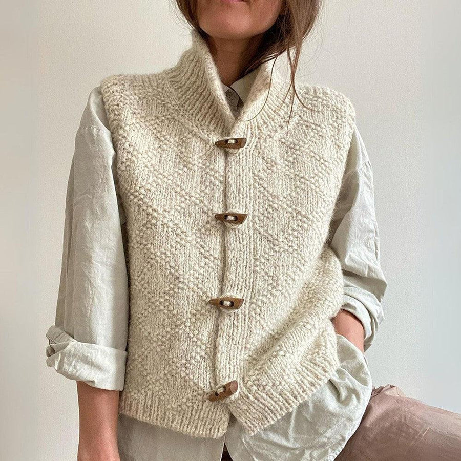 https://cdn.shopify.com/s/files/1/0646/0555/2908/files/Knitted-Button-Up-Vest-Textured-Knit-High-Collar.jpg?v=1745639294