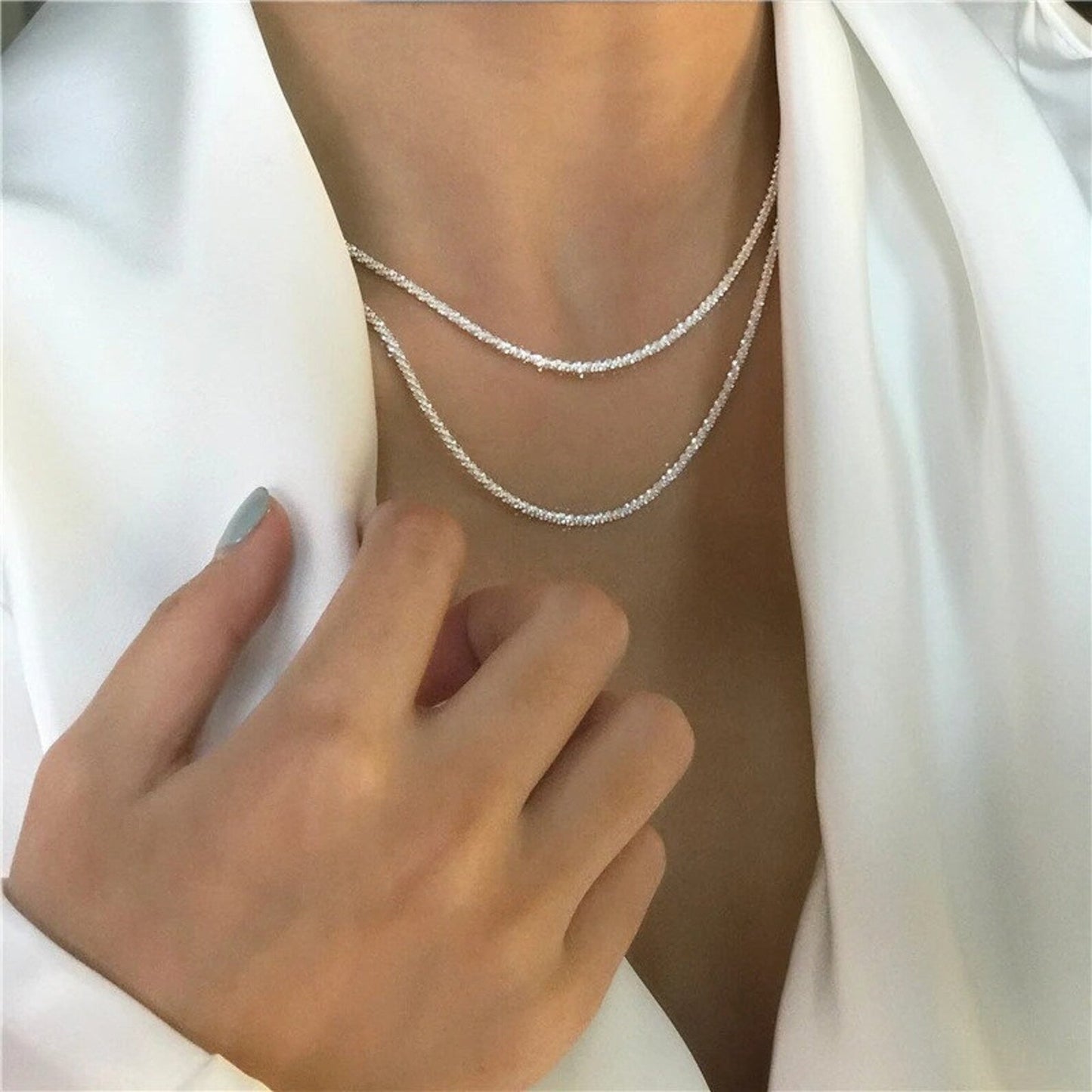 https://cdn.shopify.com/s/files/1/0765/2786/2105/products/doppelstrang_halskette_silber_front_Crystalli820.jpg?v=1742984950