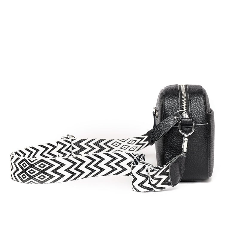https://cdn.shopify.com/s/files/1/0646/0555/2908/files/Compact-Crossbody-Bag-Sleek-Shape-Secure-Zipper-Closure-2.jpg?v=1745639001