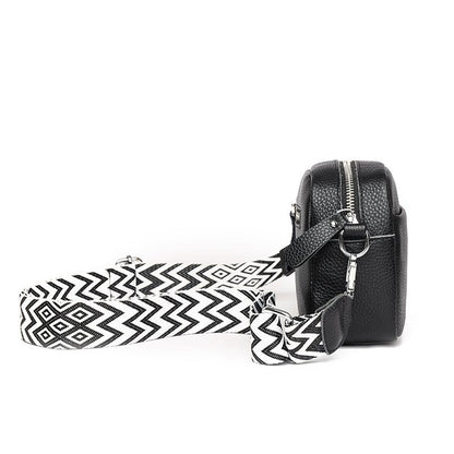 https://cdn.shopify.com/s/files/1/0646/0555/2908/files/Compact-Crossbody-Bag-Sleek-Shape-Secure-Zipper-Closure-2.jpg?v=1745639001