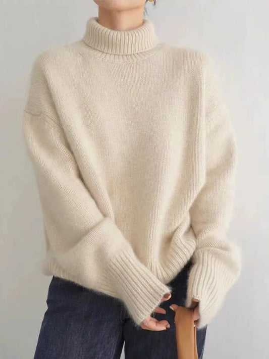 https://cdn.shopify.com/s/files/1/0646/0555/2908/files/Knit-Sweater-Turtleneck-Style-Relaxed-Fit-with-Ribbed-Details-2.webp?v=1745639140