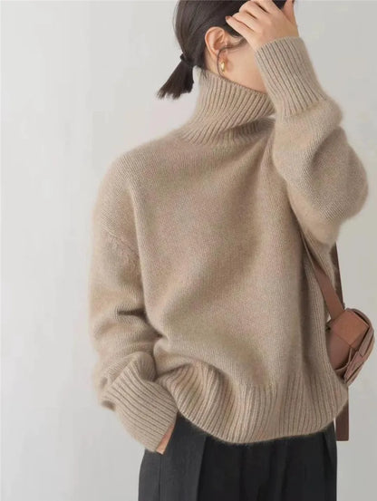 https://cdn.shopify.com/s/files/1/0646/0555/2908/files/Knit-Sweater-Turtleneck-Style-Relaxed-Fit-with-Ribbed-Details-6.webp?v=1745639140
